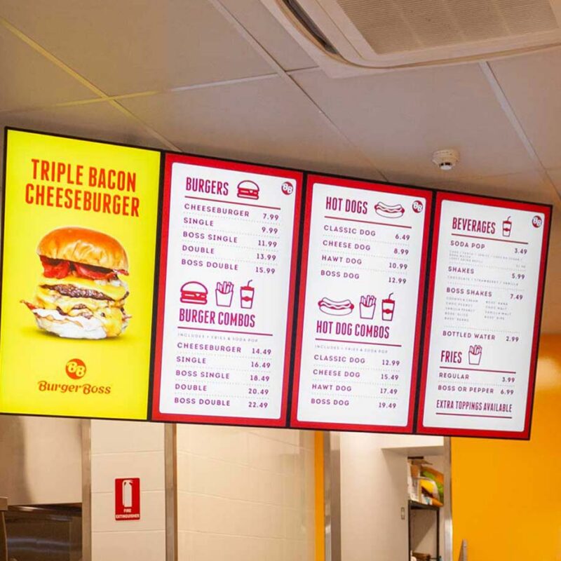 Televisions displaying restaurant menu items